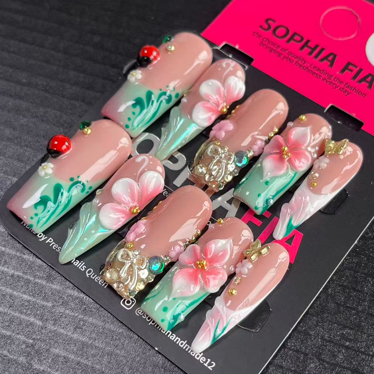 Press On Nails Long Coffin Cottagecore Spring Style - Sheer Nude Mint‑Green Gradient French, Hand‑Painted Water‑Wave Texture, 3D Pink Flower, Ladybug Charms, Gold Bow Ornaments & Tiny Gold Bead Rhinestone Acrylic Nail Tips