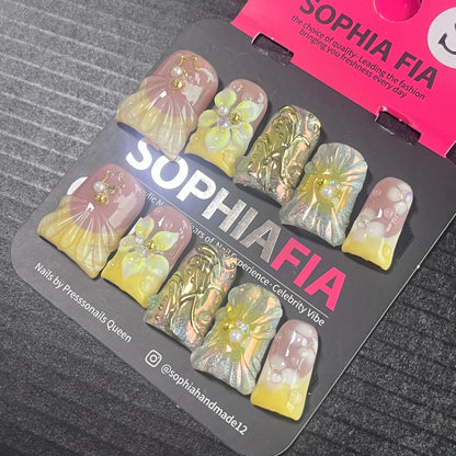 Press On Nails Short Square Soft Girl Aesthetic - Nude Pink Cream‑Yellow Gradient, 3D Shell Skirt Texture, Pearlescent Flower, Gold Butterfly Charms & Pearl Metal Stud Acrylic Nail Tips