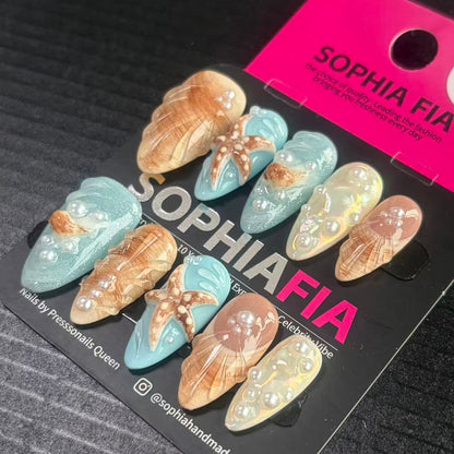 Press On Nails Long Coffin Beach‑Summer Style - Sheer Nude & Light‑Blue Glitter Base, Hand‑Carved 3D Seashell Texture, Textured Starfish Ornaments and Round Pearl Accent Acrylic Nail Tips
