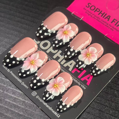 Press On Nails Medium Almond Korean Soft‑Girl Style - Sheer Nude Base Black‑White Polka‑Dot French Tip, 3D Pink Flower with Gold Bead Center Acrylic Nail Tips