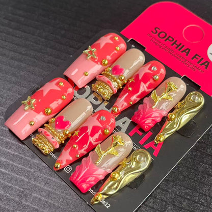 Press On Nails Long Coffin Sweet‑Girl Style - Pink‑Red Ombre Base, White Star Print, 3D Gold Star Charms, Mini Heart Accent, 3D Gold Rose and Sculpted Gold Metal Ornaments Acrylic Nail Tips