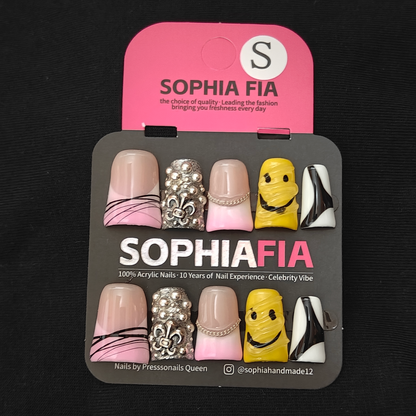Press On Nails Y2K Mix Design Short Square - Nude Pink Gradient French, Hand Drawn Yellow Smiley Face, Black White Swirl Print, Silver Fleur-de-lis Stud & Thin Silver Chain Metal Charm Acrylic Nails
