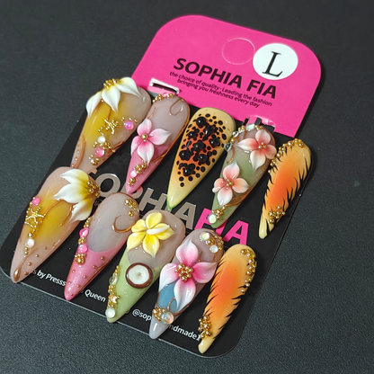 Boho Tropical Long Stiletto Press On Nails Milky Nude Background Multi‑Color 3D Plumeria Flower Mango Coconut Slice Gold Chain Wire Stud Pink Rhinestone Reusable Acrylic Nail Tips