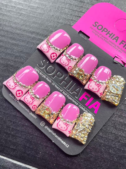 press on nails, handmade press on nails, kawaii nails, hello kitty nails, hot pink nails, rhinestone nails, gold chain nails, medium square nails, cartoon nails, reusable false nails, nail art, fake nails, y2k nails