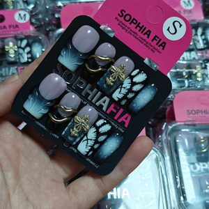 Press On Nails Long Square Gothic Y2K Dark Grunge Style - Sheer Dusty Pink Base Black Smoke Ombre Gradient, Hand Drawn White Feather Pattern, 3D Gold Cross Charms & Curved Metal Bar Accent Acrylic Nail Tips