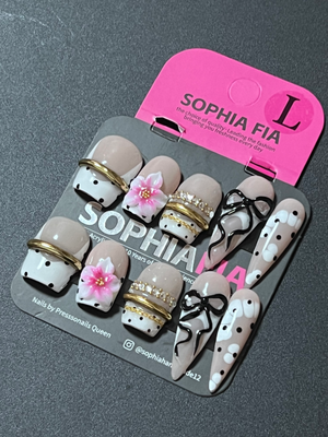 Press On Nails Long Stiletto Y2K Sweet Girl Style - Nude Base Black White Polka Dot French Tip, 3D Pink Cherry Blossom Flower, Black Bow, Gold Band & Rhinestone Chain Accent Acrylic Nail Tips